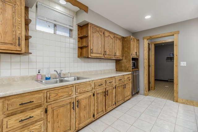 kitchen with open shelves, a sink, light countertops, brown cabinetry, and recessed lighting