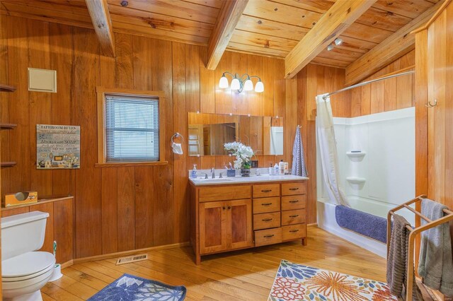 64 Trails End Ln, Doniphan, MO 63935 - bathroom with wood ceiling, beamed ceiling, toilet, hardwood / wood-style floors, and shower / bath combo