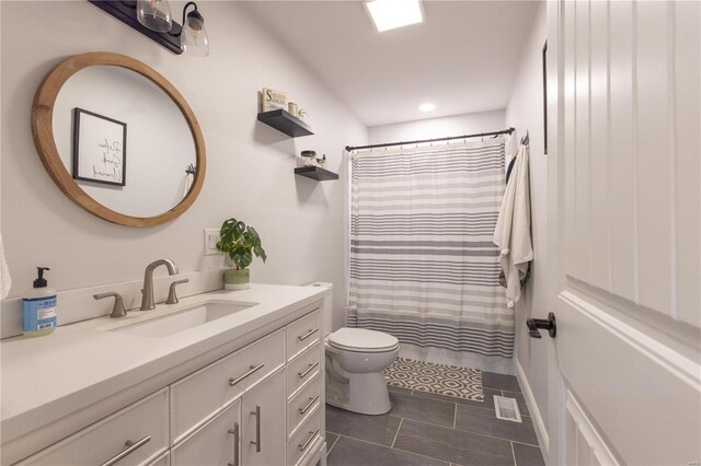 14822 Cedar Cove Pl, New London, MO 63459 - full bath featuring toilet, vanity, a shower with shower curtain, tile patterned floors, and recessed lighting