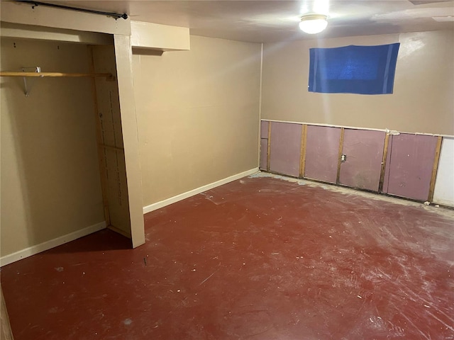 finished basement featuring baseboards