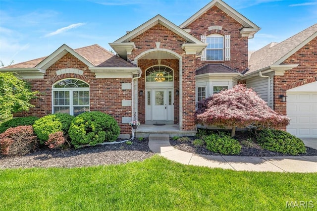 406 Clayton Hollow Dr, Wildwood, MO 63005 - traditional-style house with brick siding and a shingled roof