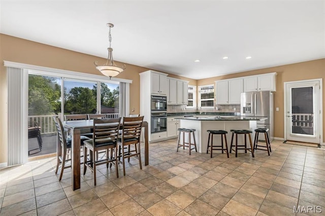 406 Clayton Hollow Dr, Wildwood, MO 63005 - dining area featuring recessed lighting and baseboards