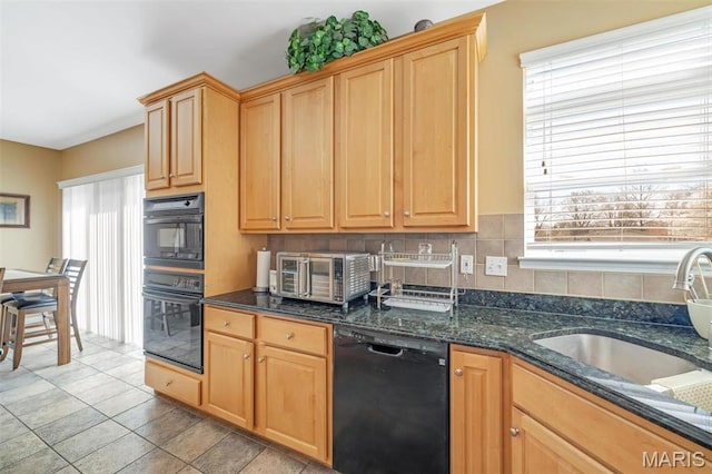 406 Clayton Hollow Dr, Wildwood, MO 63005 - kitchen with black appliances, healthy amount of natural light, a sink, and light tile patterned flooring