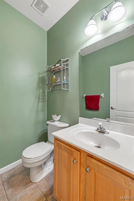 406 Clayton Hollow Dr, Wildwood, MO 63005 - bathroom with toilet, vanity, and baseboards