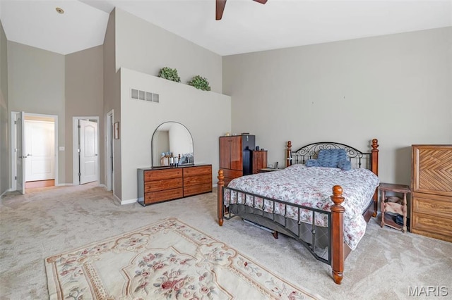 406 Clayton Hollow Dr, Wildwood, MO 63005 - carpeted bedroom with high vaulted ceiling, baseboards, and ceiling fan