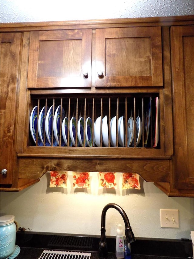 1201 Condo Dr, Rolla, MO 65401 - kitchen view of brown cabinetry