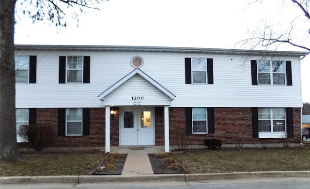 1201 Condo Dr, Rolla, MO 65401 - view of front of house with brick siding and french doors