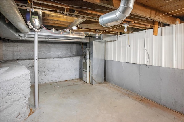 unfinished basement with heating unit