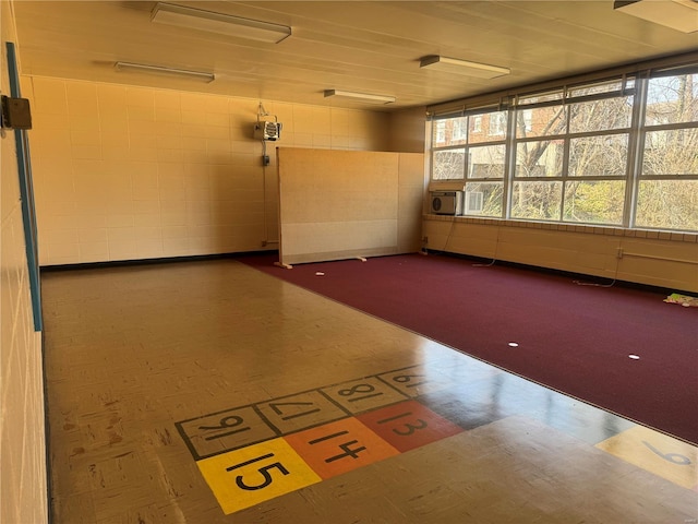 700 Charles St, Poplar Bluff, MO 63901 - unfurnished room featuring tile patterned floors and concrete block wall