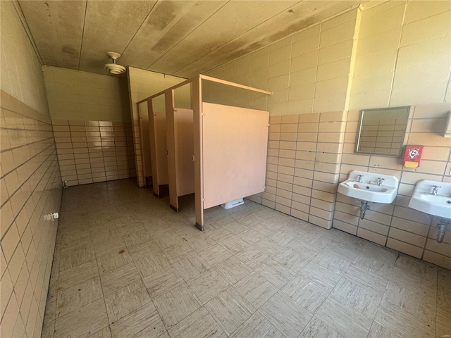700 Charles St, Poplar Bluff, MO 63901 - bathroom featuring tile walls, a sink, and walk in shower