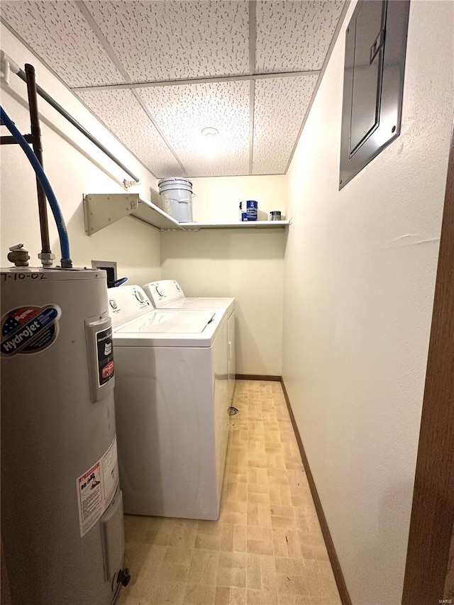 1308 Condo Dr, Rolla, MO 65401 - washroom with electric water heater, washing machine and clothes dryer, and baseboards