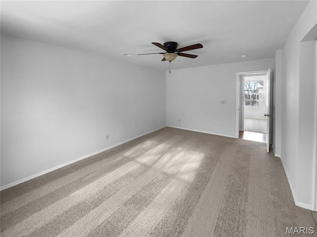 813 Sugar Valley Ct Unit 8, Saint Peters, MO 63376 - empty room with ceiling fan, carpet flooring, and baseboards
