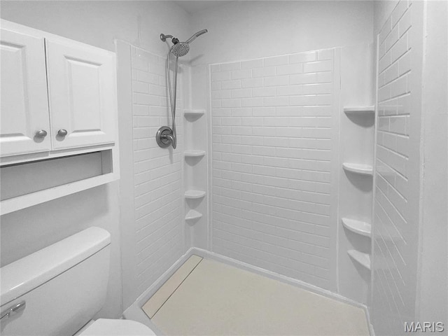 813 Sugar Valley Ct Unit 8, Saint Peters, MO 63376 - bathroom featuring toilet and a tile shower