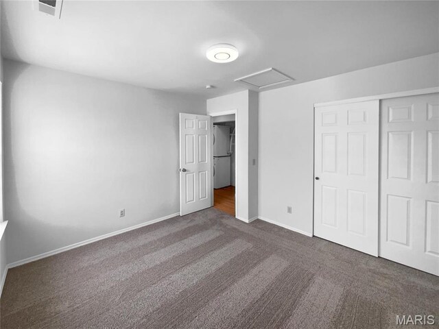 813 Sugar Valley Ct Unit 8, Saint Peters, MO 63376 - unfurnished bedroom with carpet floors, attic access, baseboards, a closet, and freestanding refrigerator