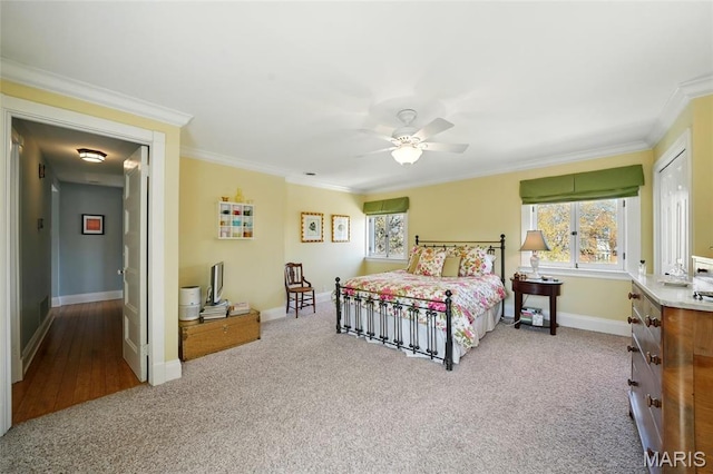 4386 Westminster Pl, Saint Louis, MO 63108 - carpeted bedroom featuring crown molding and ceiling fan