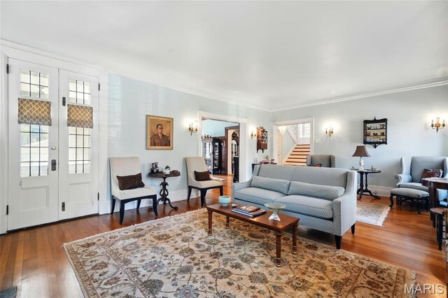 4386 Westminster Pl, Saint Louis, MO 63108 - living room featuring stairway, wood finished floors, ornamental molding, and french doors