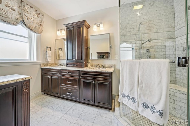 4386 Westminster Pl, Saint Louis, MO 63108 - bathroom featuring double vanity and a stall shower