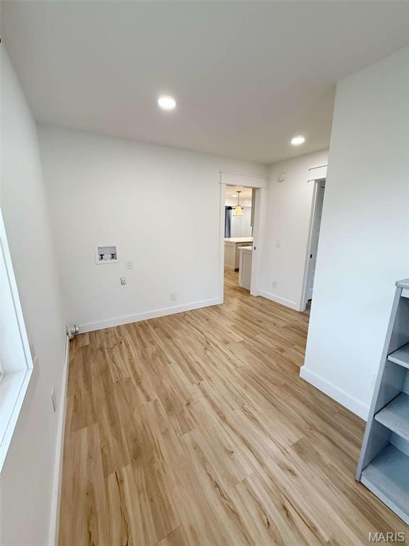 1400 S Jackson St, Salem, MO 65560 - spare room with light wood-style flooring, recessed lighting, and baseboards