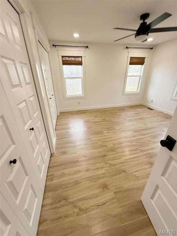 1400 S Jackson St, Salem, MO 65560 - unfurnished room with a ceiling fan, healthy amount of natural light, baseboards, light wood-type flooring, and recessed lighting
