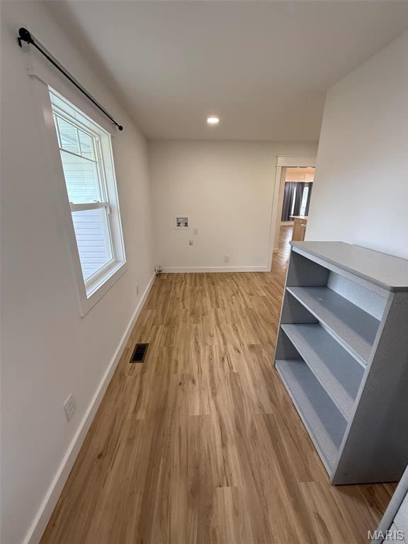 1400 S Jackson St, Salem, MO 65560 - spare room featuring baseboards, light wood-type flooring, and recessed lighting