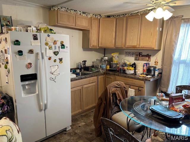 477 W Lakeview Dr, Ironton, MO 63650 - kitchen with white fridge with ice dispenser, ceiling fan, and dark countertops