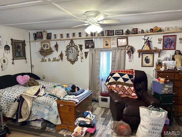 477 W Lakeview Dr, Ironton, MO 63650 - bedroom featuring wood finished floors, ornamental molding, and a ceiling fan