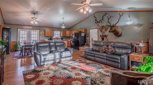 2630 Melody Ln, Cuba, MO 65453 - living area featuring ceiling fan, light wood-style floors, a wainscoted wall, lofted ceiling, and ornamental molding