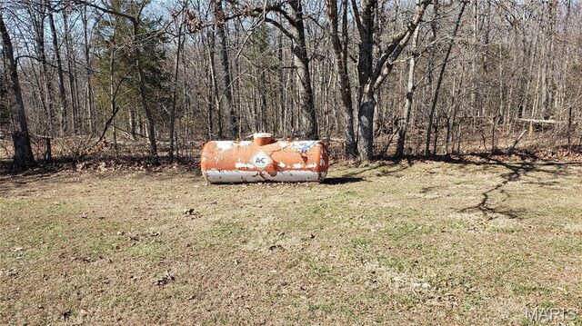 2630 Melody Ln, Cuba, MO 65453 - view of green lawn with a forest view