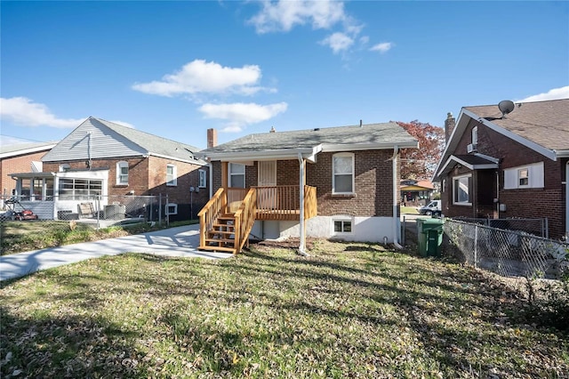 3433 Pine Grove Ave, Saint Louis, MO 63121 - rear view of property featuring brick siding and a chimney