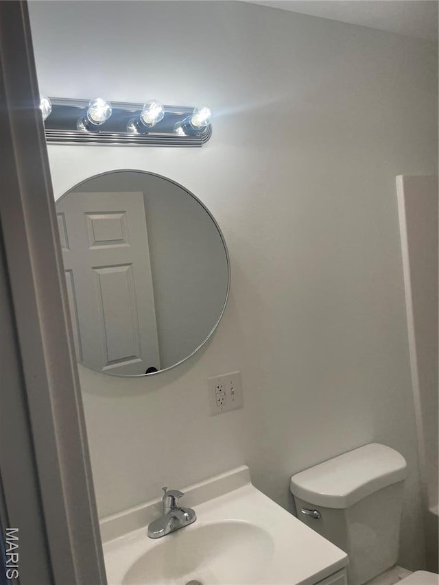 806 E Dover St, Monroe City, MO 63456 - bathroom with toilet and vanity