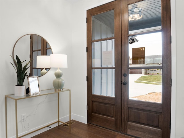 101 Stone Canyon Blvd, Foristell, MO 63348 - entryway with dark wood-style floors, baseboards, and french doors
