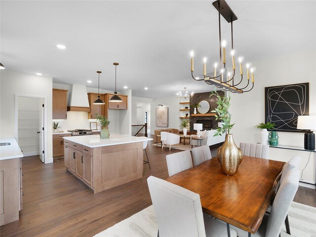 101 Stone Canyon Blvd, Foristell, MO 63348 - dining room with dark wood-style floors, a chandelier, and recessed lighting