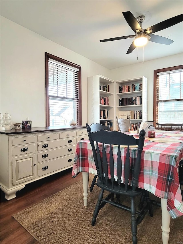 305 Williams St, Washington, MO 63090 - dining room with dark wood-style flooring and ceiling fan