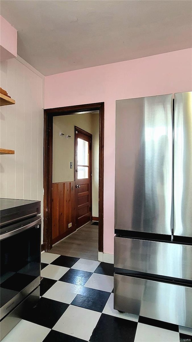 305 Williams St, Washington, MO 63090 - corridor featuring tile patterned floors and wooden walls