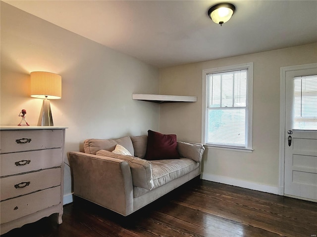 305 Williams St, Washington, MO 63090 - living area featuring baseboards and dark wood finished floors
