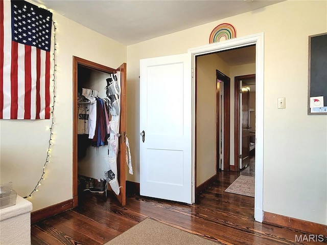 305 Williams St, Washington, MO 63090 - bedroom featuring hardwood / wood-style flooring and a closet