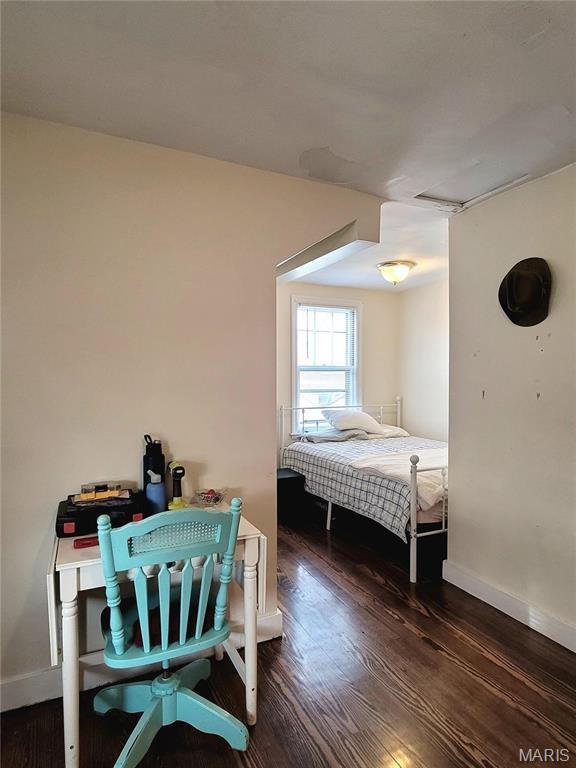 305 Williams St, Washington, MO 63090 - bedroom featuring wood finished floors