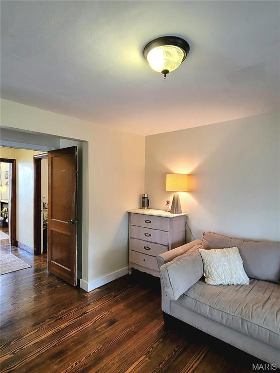 305 Williams St, Washington, MO 63090 - living area featuring dark wood finished floors