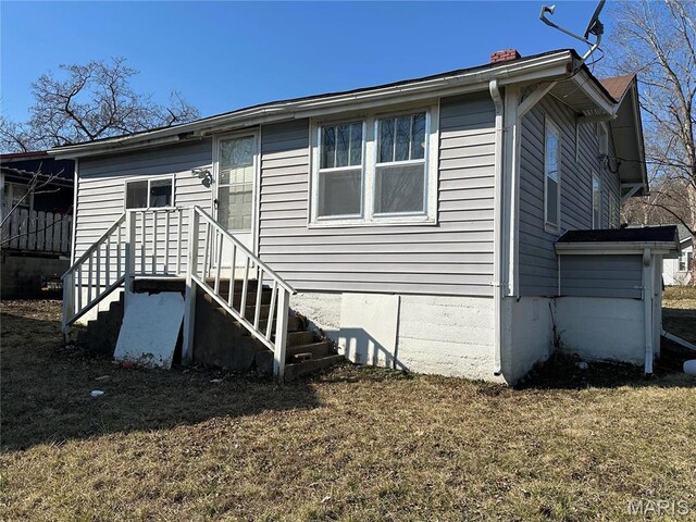 507 N Knob St, Ironton, MO 63650 - back of house with a chimney and a yard