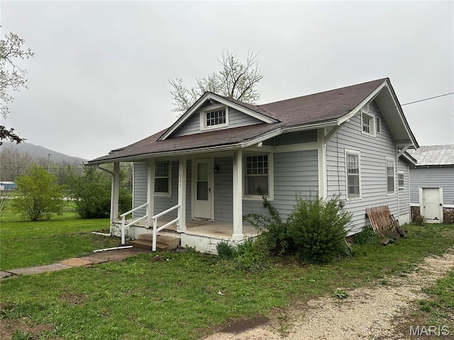 507 N Knob St, Ironton, MO 63650 - view of front of house with covered porch and a front yard