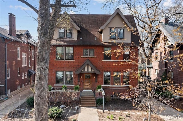 6230 Waterman Ave, Saint Louis, MO 63130 - tudor house with brick siding