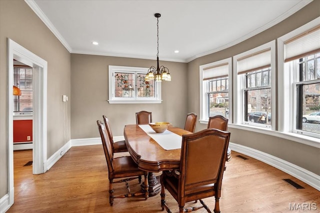 6230 Waterman Ave, Saint Louis, MO 63130 - dining room with ornamental molding, baseboards, a chandelier, light wood-type flooring, and recessed lighting