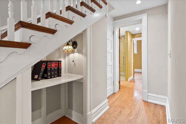 6230 Waterman Ave, Saint Louis, MO 63130 - hallway featuring light wood-style flooring, recessed lighting, and baseboards