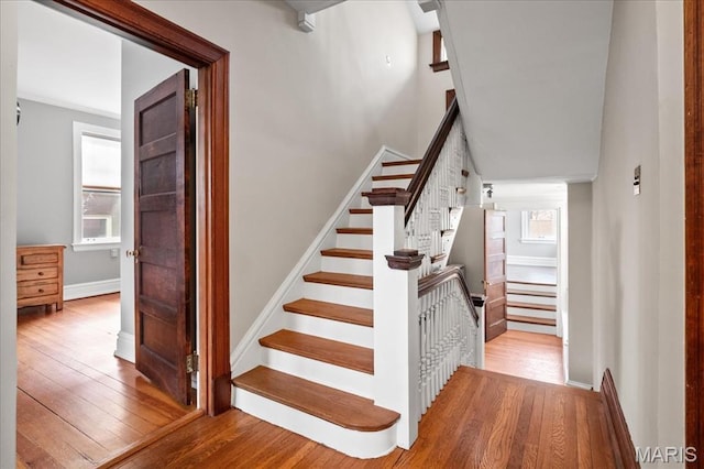 6230 Waterman Ave, Saint Louis, MO 63130 - staircase featuring hardwood / wood-style floors and baseboards