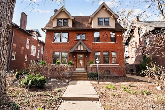 6230 Waterman Ave, Saint Louis, MO 63130 - view of front of house with brick siding and a chimney
