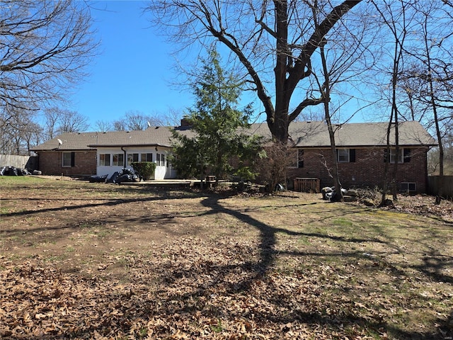 400 Smith Rd, Lebanon, MO 65536 - rear view of property with brick siding and fence