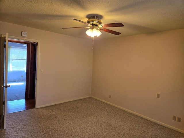 400 Smith Rd, Lebanon, MO 65536 - carpeted empty room with a ceiling fan, baseboards, and a textured ceiling