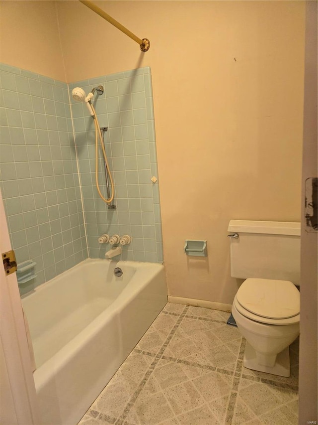 400 Smith Rd, Lebanon, MO 65536 - full bathroom featuring toilet, baseboards,  shower combination, and tile patterned floors