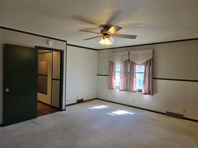 400 Smith Rd, Lebanon, MO 65536 - unfurnished bedroom with crown molding, carpet floors, a textured ceiling, baseboards, and ceiling fan