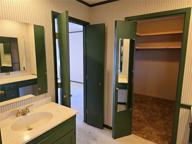 400 Smith Rd, Lebanon, MO 65536 - bathroom featuring wallpapered walls and vanity